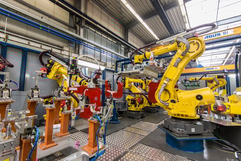Automatisierte Fügeanlagen: Produktionssystem für zwei Heckbodenderivate
